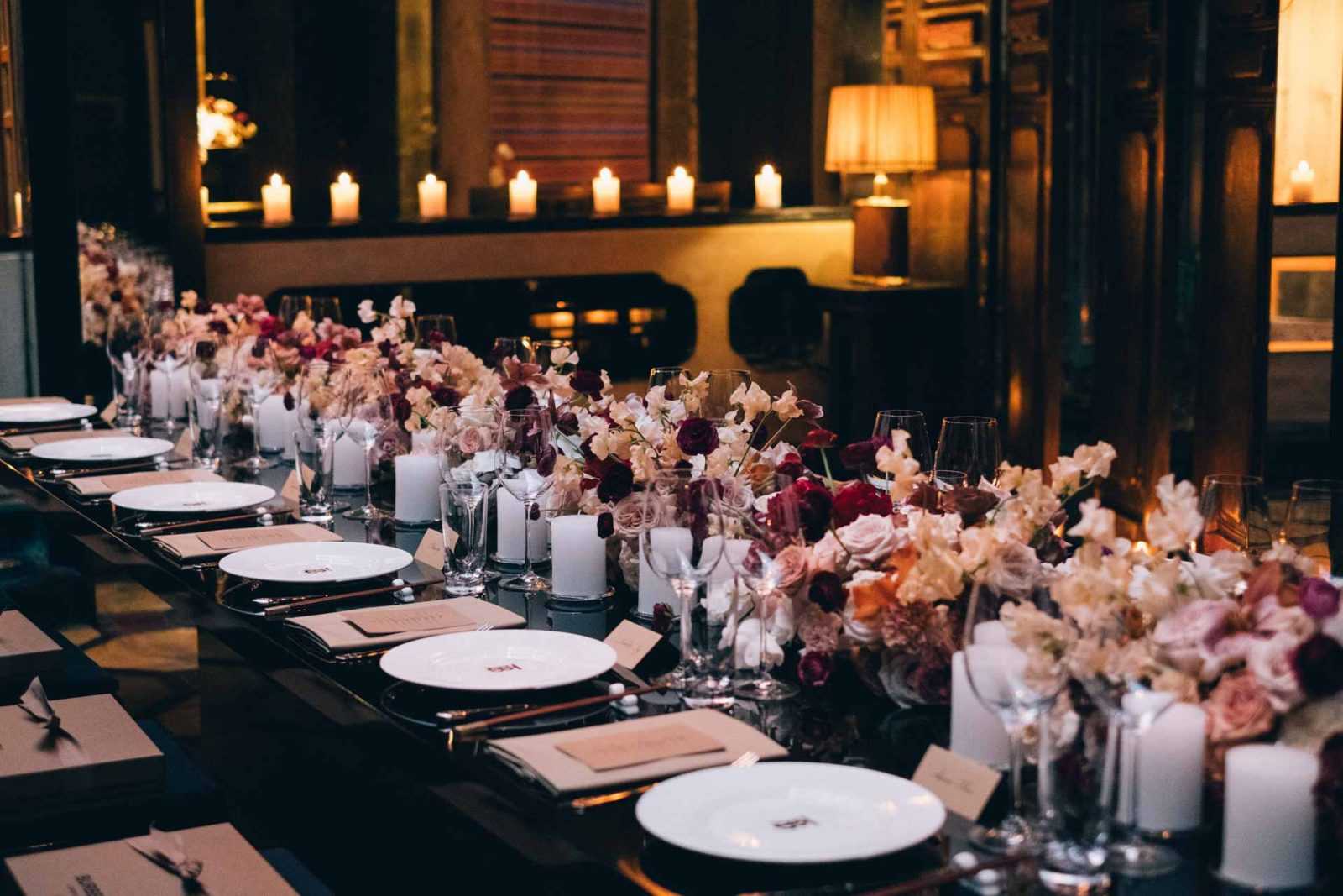 A classic and romantic table flowers beige and burgundy flowers table flower garland for Burberry by Shanghai florist and set designer Daria Bokova