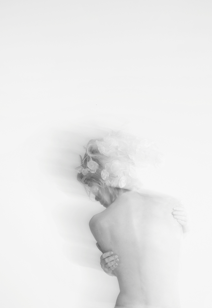 a girl painted in white body black and white photo by Florist and set designer in Shanghai China Daria Bokova